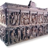 Ancient Christian stone coffin depicting biblical scenes