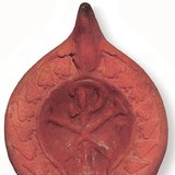 Christogram em uma vela