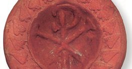 Christogram em uma vela