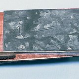 The zinc and copper plates are connected with an electrolyte