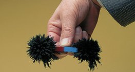 Pó de ferro numa barra magnética