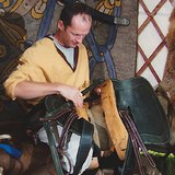 Saddler at work today, practicing an ancient trade