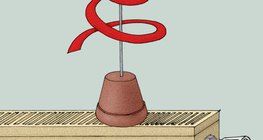 Cobra de papel colocada no aquecedor