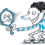 Bohóc ruhás fiú vigyorog, de a tükörképe sír