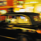 Ônibus e táxi em Londres