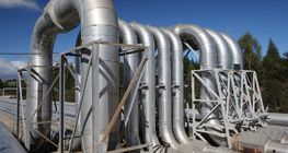 Uma curva em um tubo que é usado para eliminar a expansão térmica