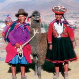 Peruvian Indians with their favorite pack animal, a llama